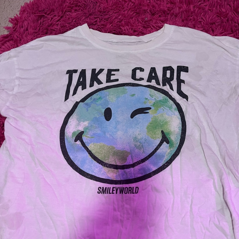 White smiley face shirt